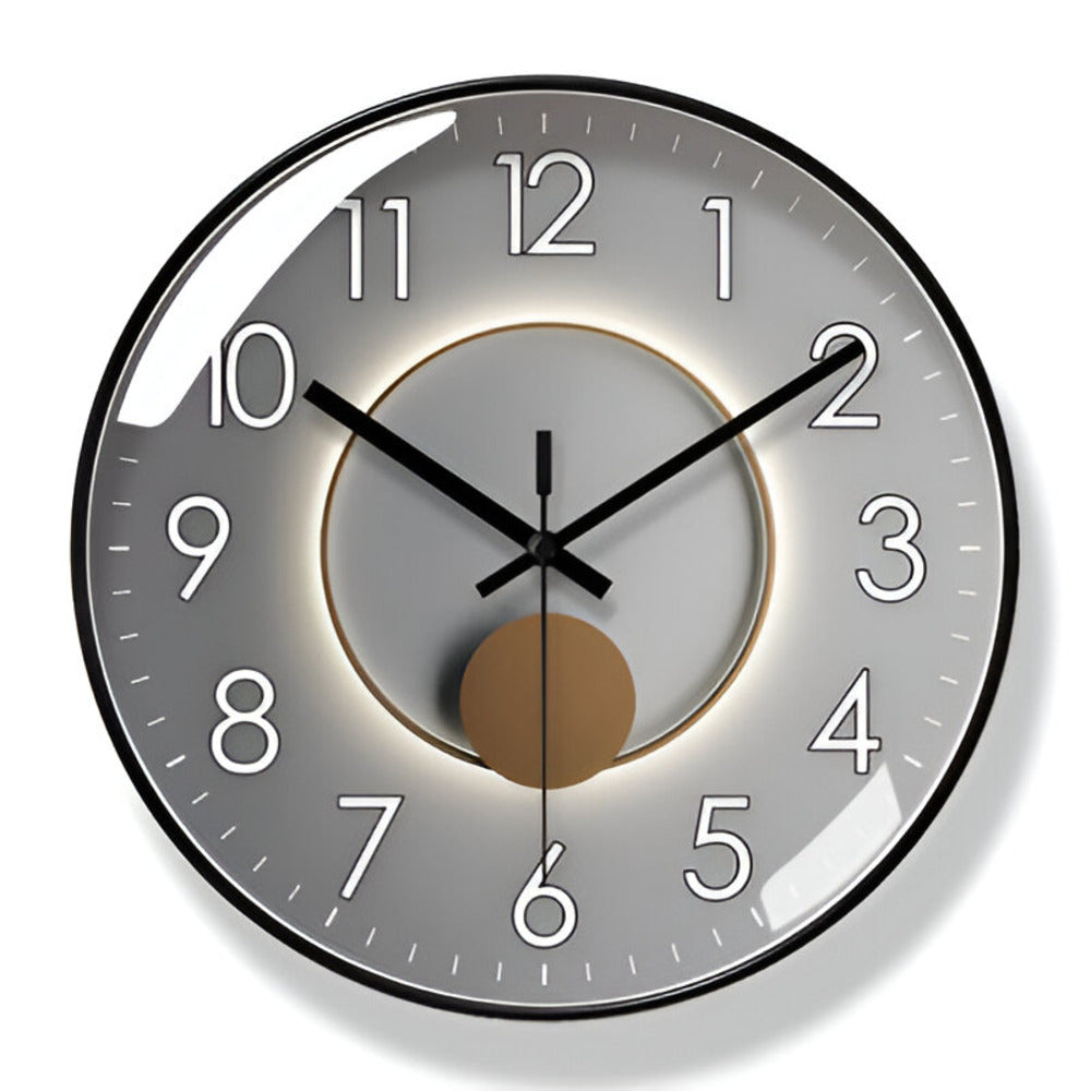 Round wall clock with black hands and white numbers on a gray background