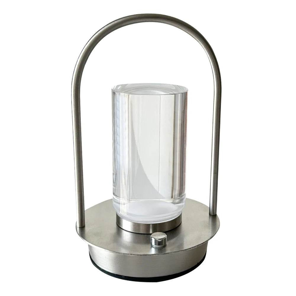 Stainless steel outdoor lantern with clear glass shade on a white background