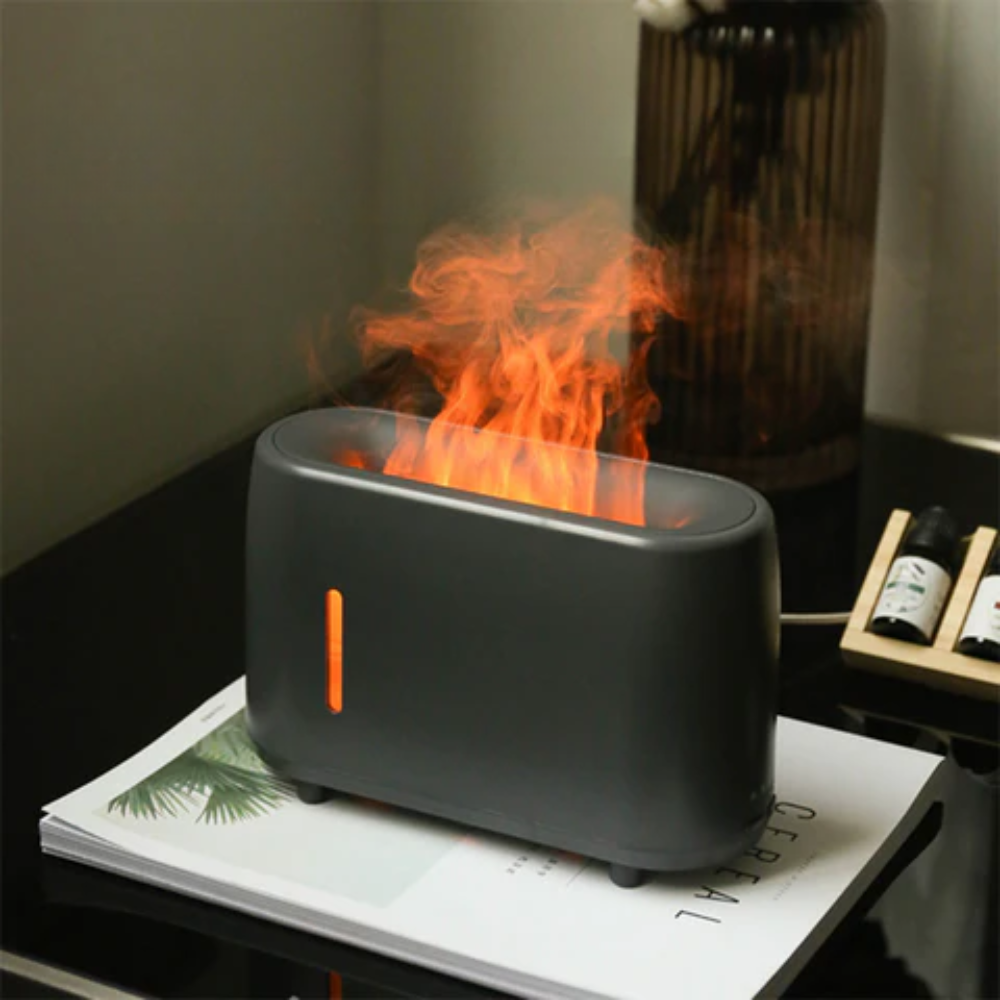 Black fire pit with flames on a magazine