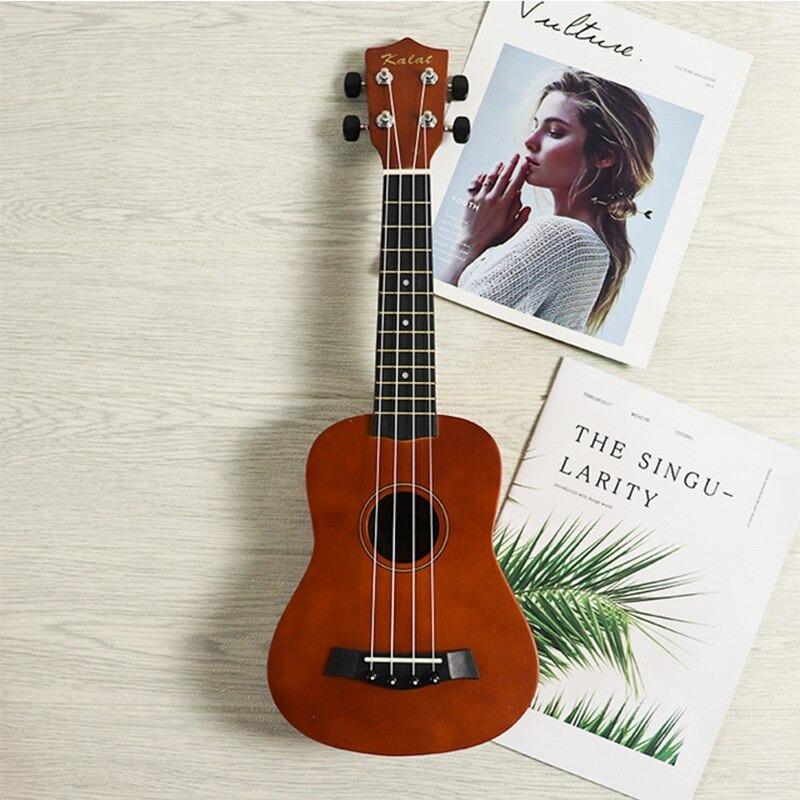 Compact 4 String Travel Guitar - Halri