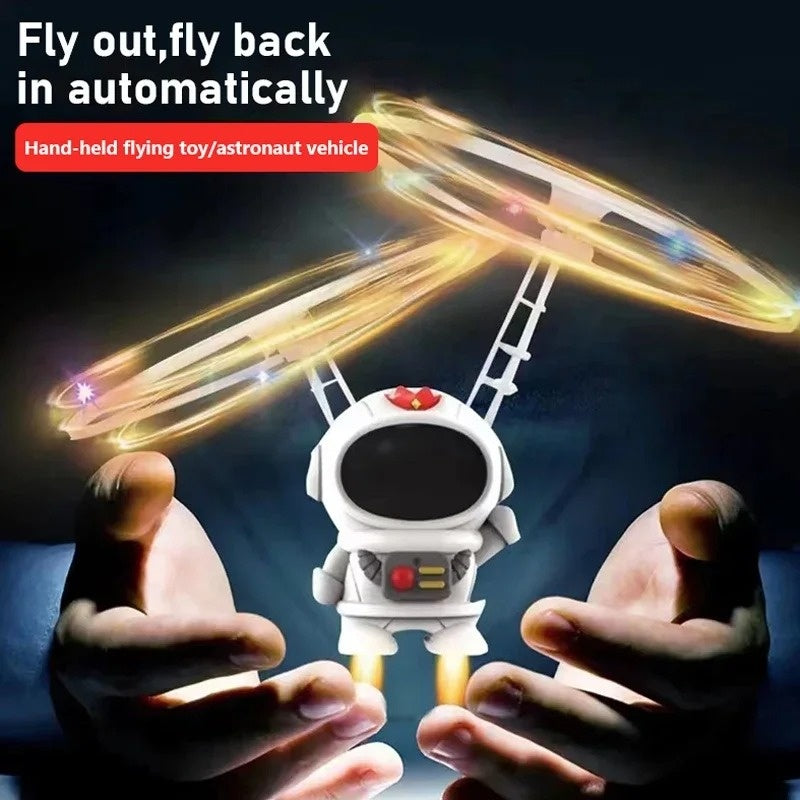 Interactive Flying Mini Astronaut Drone – Hand-Controlled Robot Toy with Lights, Perfect Outdoor Fun Gift for Kids