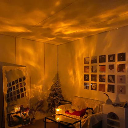 Living room with a Christmas tree, couch, and wall decorations.