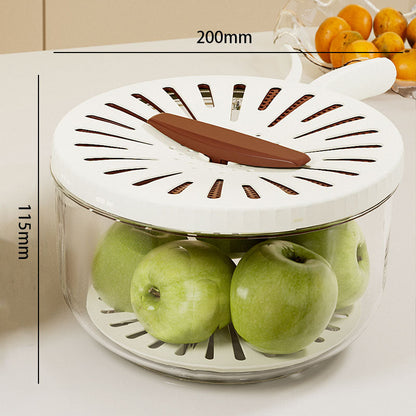Fruit storage container with apples and a brown fruit, labeled dimensions.
