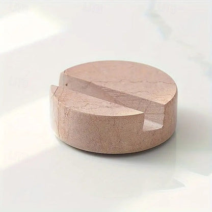 Round stone object on a white background