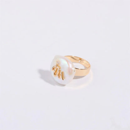 Big Astrology Pearl Cocktail Ring